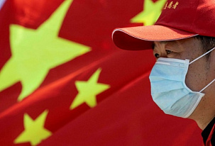 Čína uvolňuje protikovidová opatření, ale na úplné zrušení se bude muset ještě počkat
